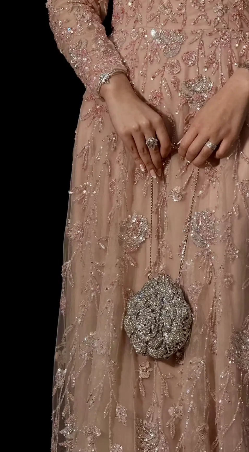 Blush evening gown with floral sequin and bead embroidery and a crystal rose clutch