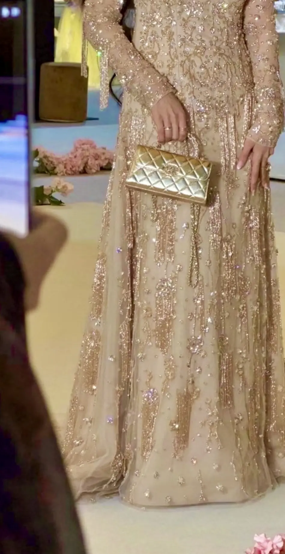 Champagne evening gown with crystal embroidery and beaded fringe